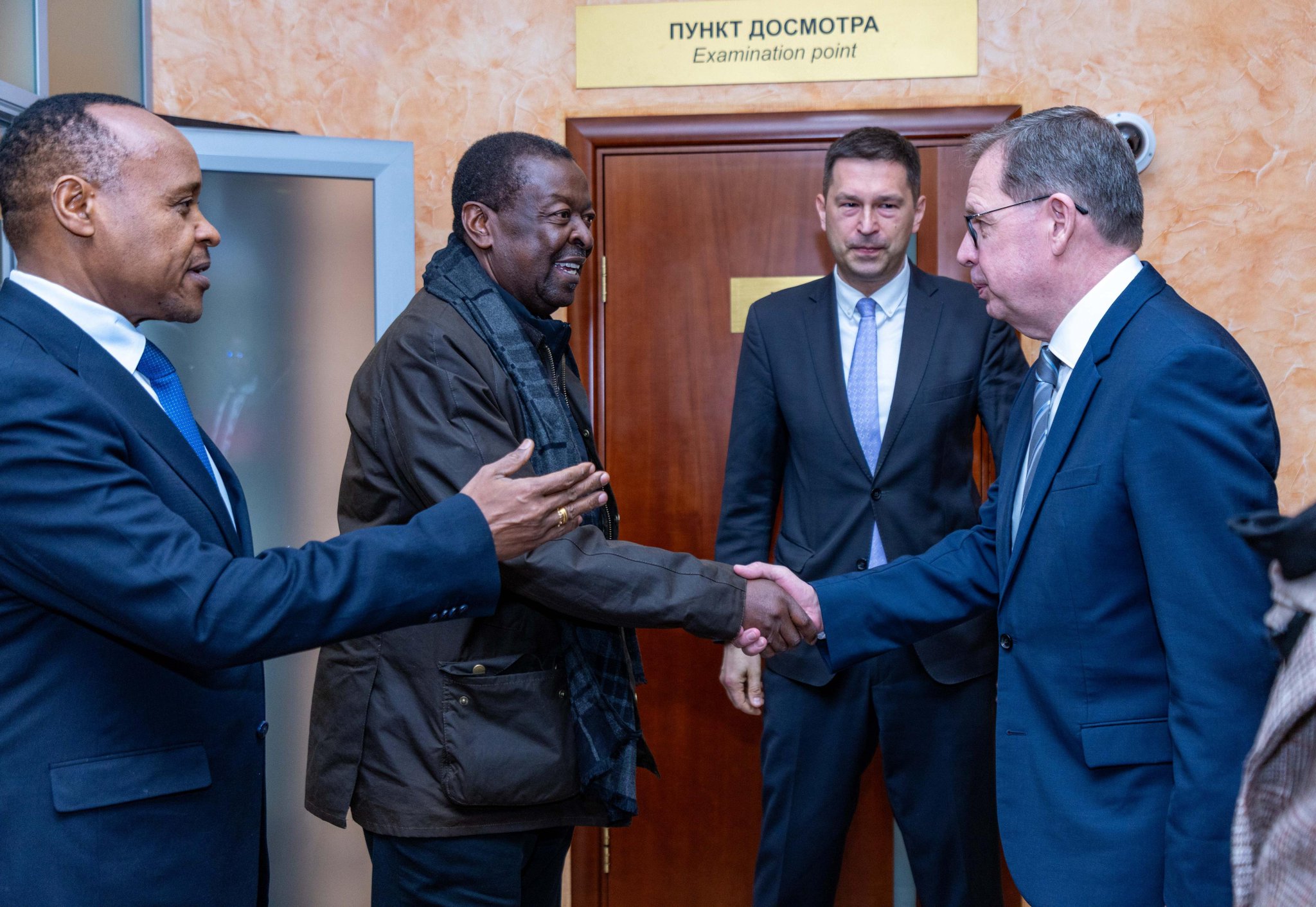 kenyan finance minister shaking hand in moscow